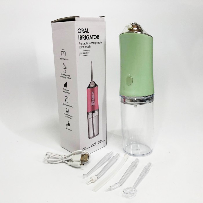 Іригатор для чищення зубів та порожнини рота Oral Irrigator з акумулятором та змінними насадками. Колір: зелений IC-20