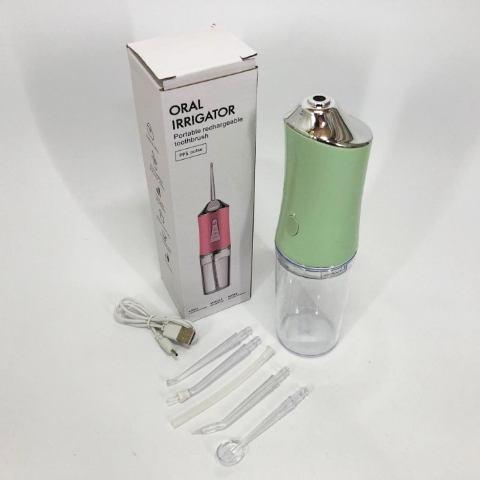 Іригатор для чищення зубів та порожнини рота Oral Irrigator з акумулятором та змінними насадками. Колір: зелений IC-20