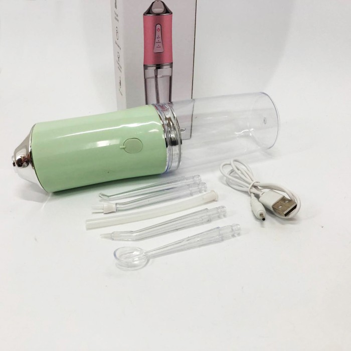 Іригатор для чищення зубів та порожнини рота Oral Irrigator з акумулятором та змінними насадками. Колір: зелений LZ-81