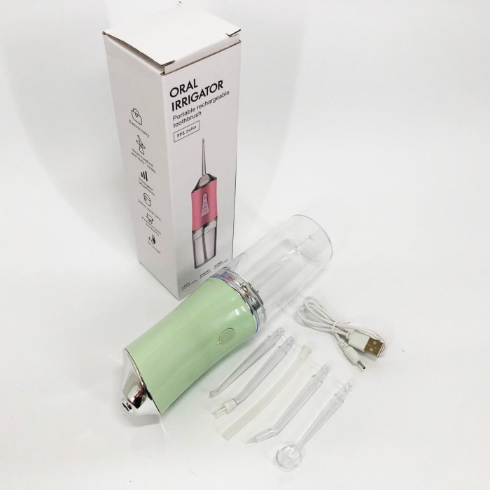 Іригатор для чищення зубів та порожнини рота Oral Irrigator з акумулятором та змінними насадками. Колір: зелений LZ-81