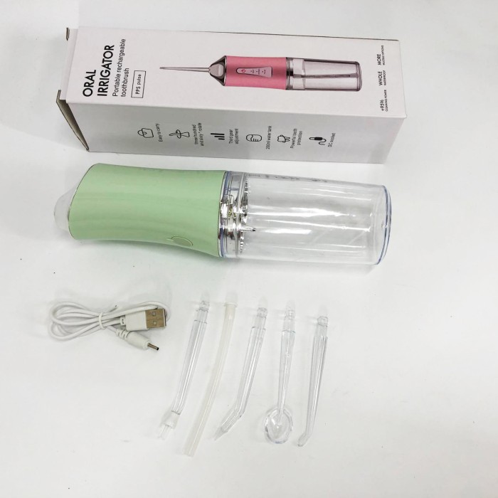 Іригатор для чищення зубів та порожнини рота Oral Irrigator з акумулятором та змінними насадками. Колір: зелений VI-49