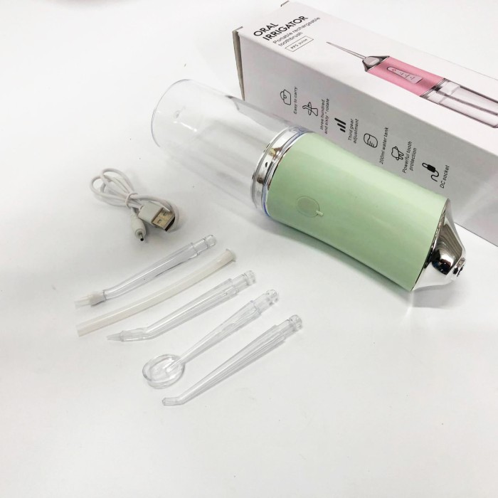 Іригатор для чищення зубів та порожнини рота Oral Irrigator з акумулятором та змінними насадками. Колір: зелений VI-49