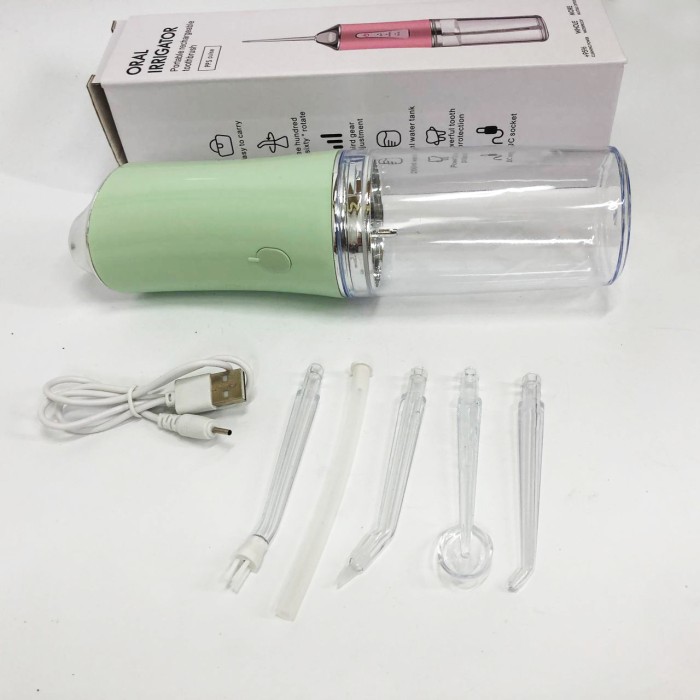 Іригатор для чищення зубів та порожнини рота Oral Irrigator з акумулятором та змінними насадками. Колір: зелений VI-49