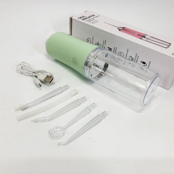 Іригатор для чищення зубів та порожнини рота Oral Irrigator з акумулятором та змінними насадками Green