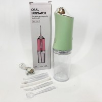 Іригатор для чищення зубів та порожнини рота Oral Irrigator з акумулятором та змінними насадками. PB-547 Колір: зелений