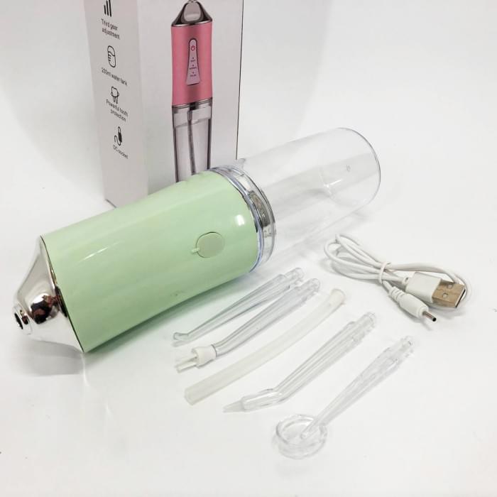 Іригатор для чищення зубів та порожнини рота Oral Irrigator з акумулятором та змінними насадками. PB-547 Колір: зелений