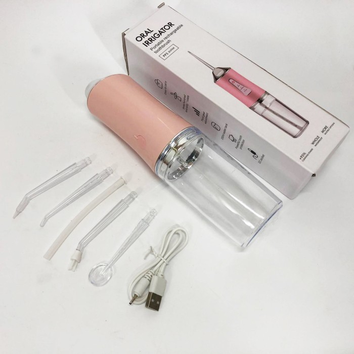 Іригатор для чищення зубів та порожнини рота Oral Irrigator з акумулятором та змінними насадками. Колір: рожевий YR-17