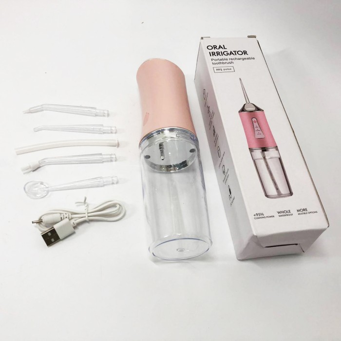 Іригатор для чищення зубів та порожнини рота Oral Irrigator з акумулятором та змінними насадками. Колір: рожевий WP-96