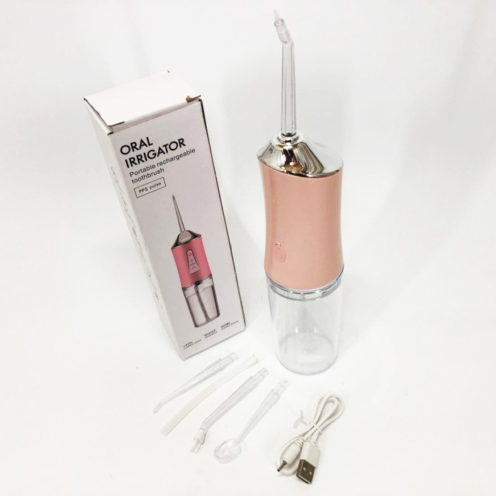 Іригатор для чищення зубів та порожнини рота Oral Irrigator з акумулятором та змінними насадками. Колір: рожевий ZQ-77