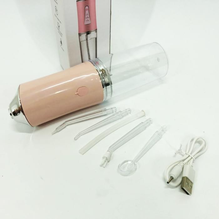 Іригатор для чищення зубів та порожнини рота Oral Irrigator з акумулятором та змінними насадками. OS-286 Колір: рожевий