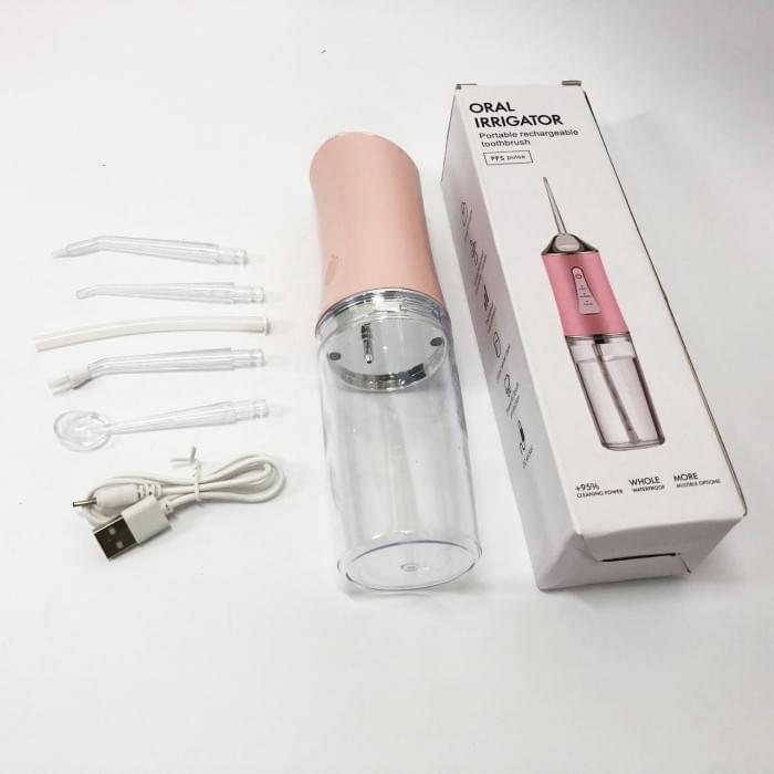 Іригатор для чищення зубів та порожнини рота Oral Irrigator з акумулятором та змінними насадками. OS-286 Колір: рожевий