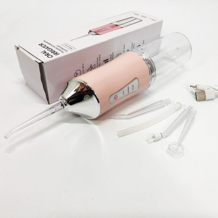 Іригатор для чищення зубів та порожнини рота Oral Irrigator з акумулятором та змінними насадками Pink