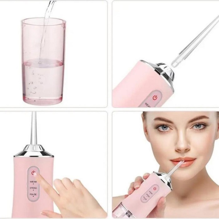 Іригатор для чищення зубів та порожнини рота Oral Irrigator з акумулятором та змінними насадками Pink