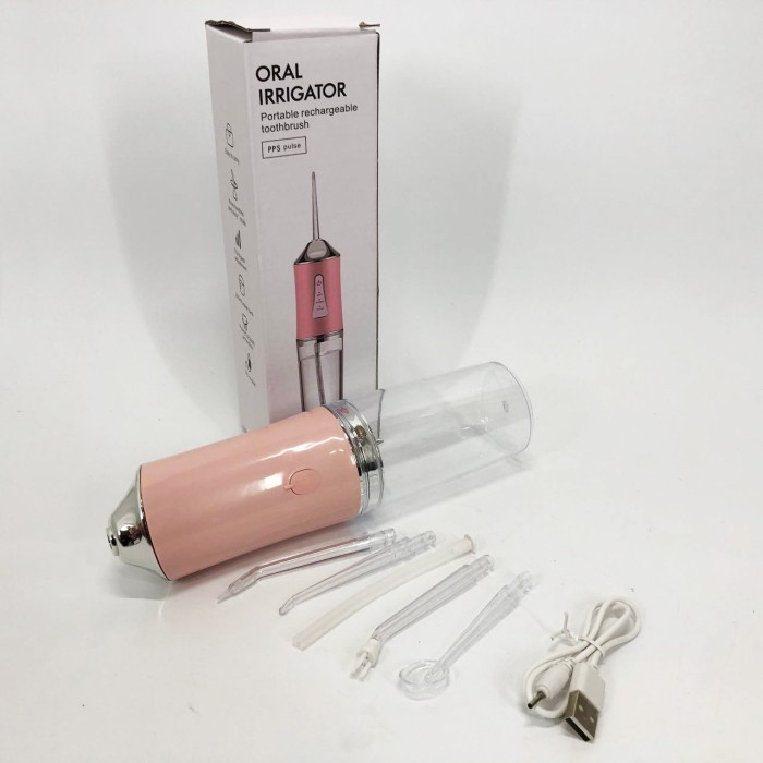 Іригатор для чищення зубів та порожнини рота Oral Irrigator з акумулятором та змінними насадками Pink