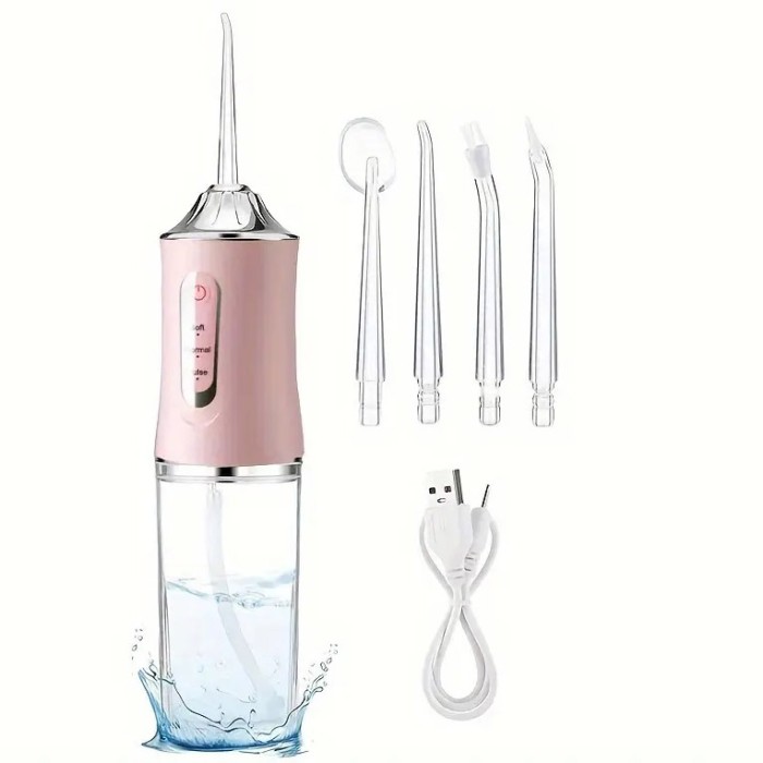 Іригатор для чищення зубів та порожнини рота Oral Irrigator з акумулятором та змінними насадками Pink