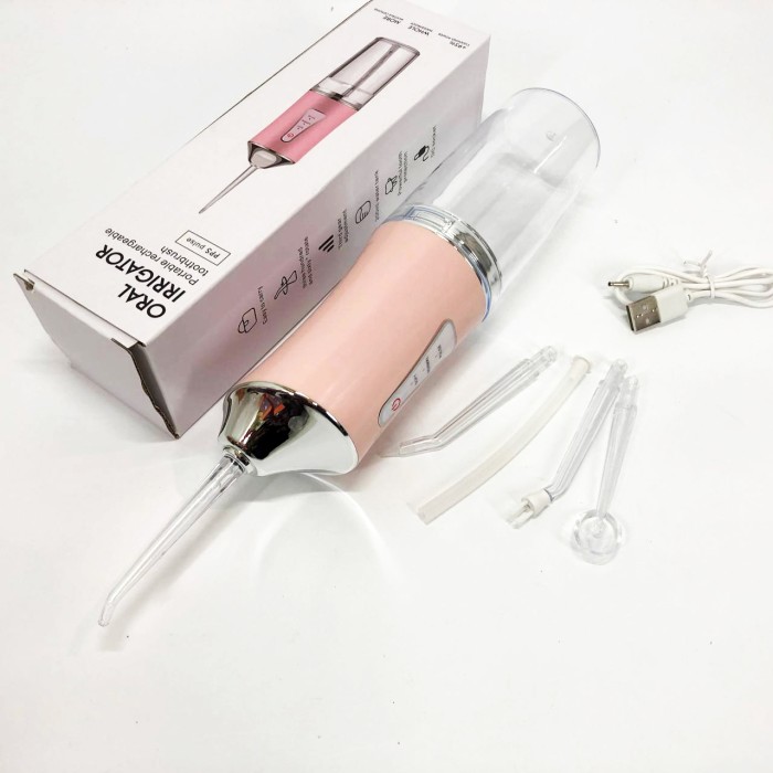 Іригатор для чищення зубів та порожнини рота Oral Irrigator з акумулятором та змінними насадками Pink
