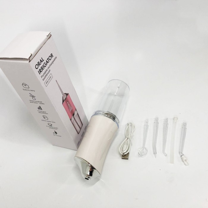 Іригатор для чищення зубів та порожнини рота Oral Irrigator з акумулятором та змінними насадками. Колір: білий IE-28