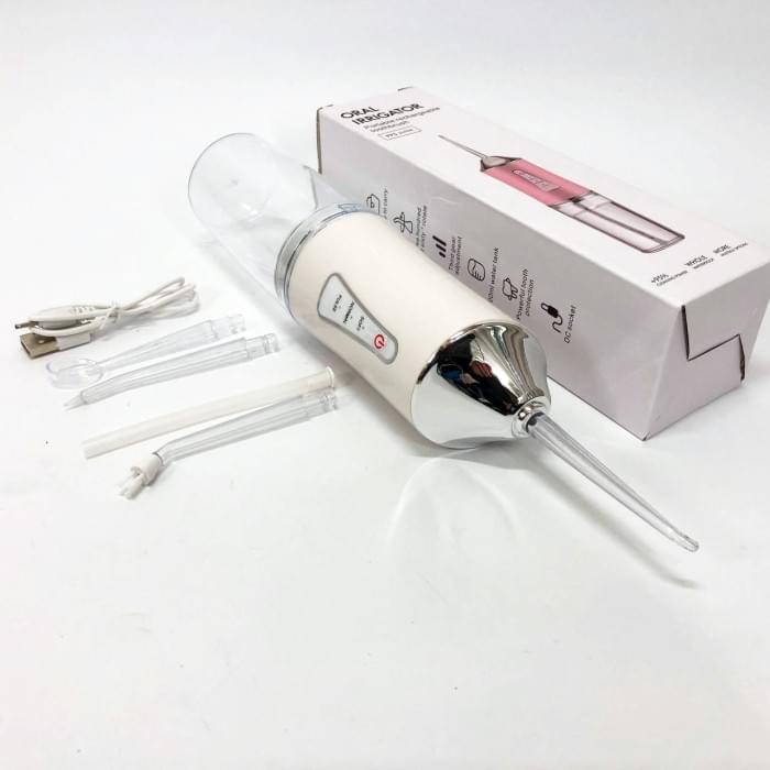 Іригатор для чищення зубів та порожнини рота Oral Irrigator з акумулятором та змінними насадками. AS-727 Колір: білий