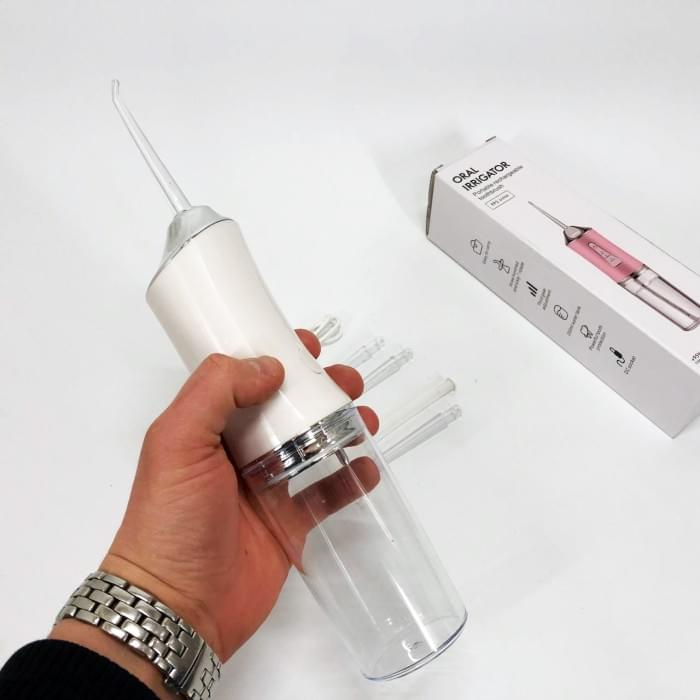 Іригатор для чищення зубів та порожнини рота Oral Irrigator з акумулятором та змінними насадками. AS-727 Колір: білий